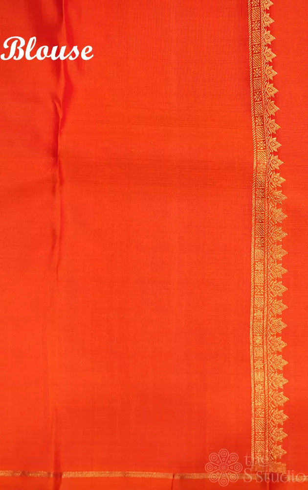 Brown kolam butta kanjivaram saree with orange pallu and blouse