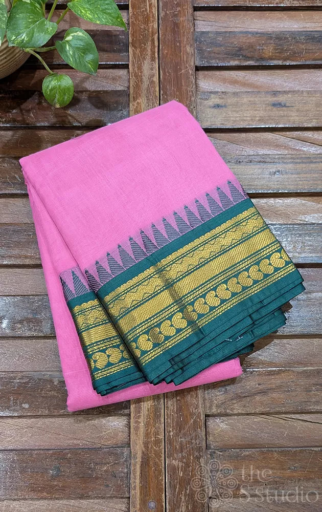 Pink gadwal cotton saree with dark green temple border