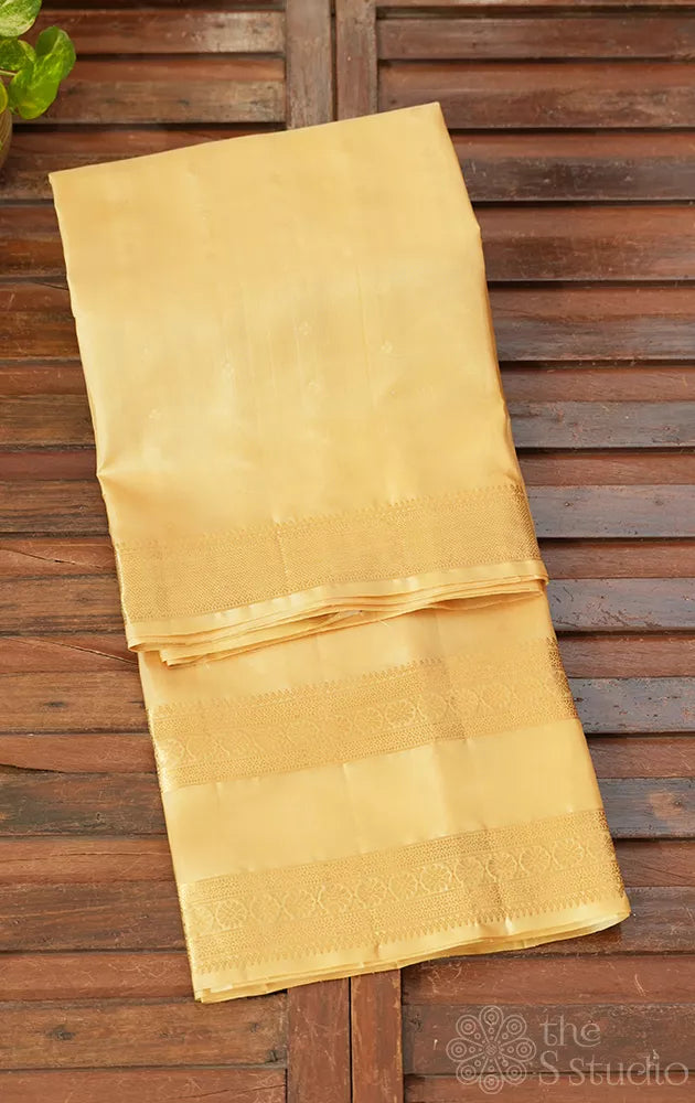 Cream colour soft silk saree with rettaipet zari border
