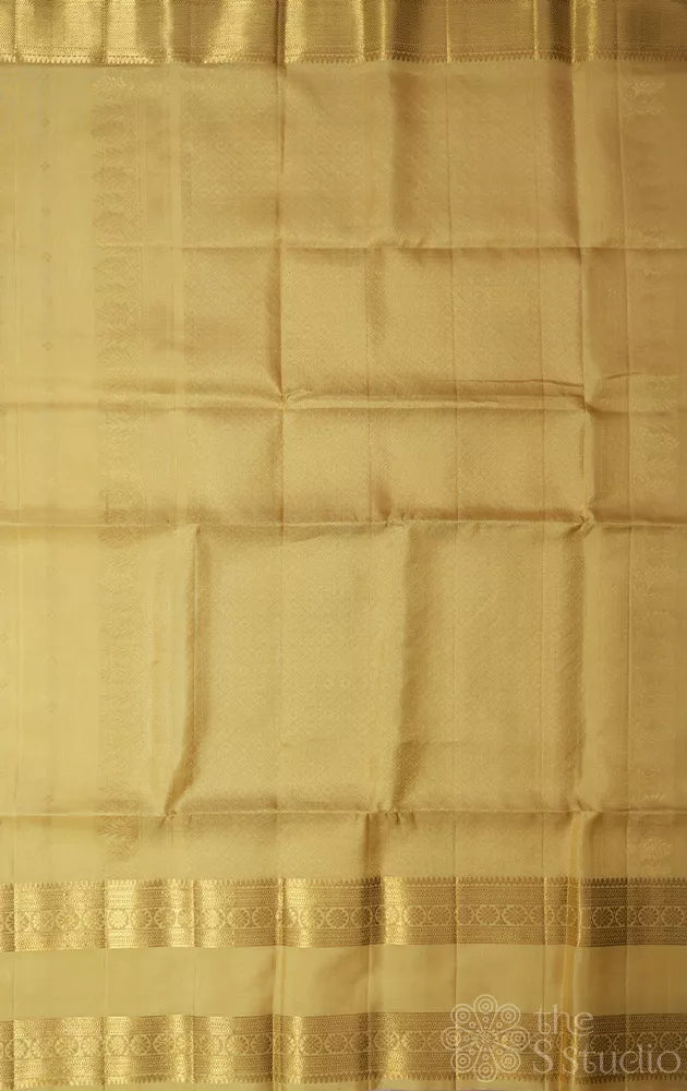 Cream colour soft silk saree with rettaipet zari border