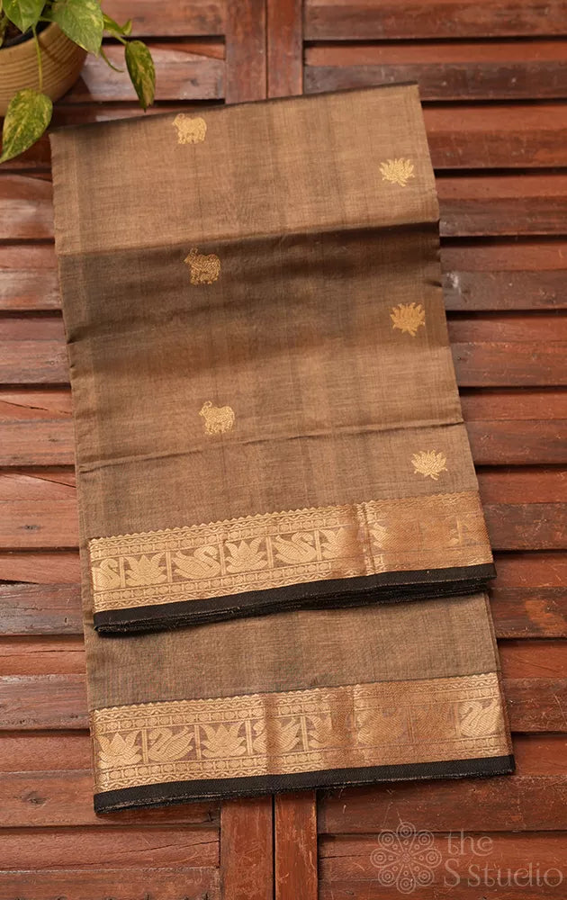 Gold silk cotton saree with zari woven pichwai motifs