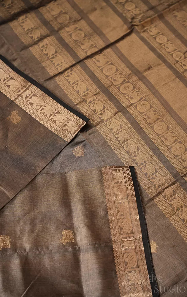 Gold silk cotton saree with zari woven pichwai motifs