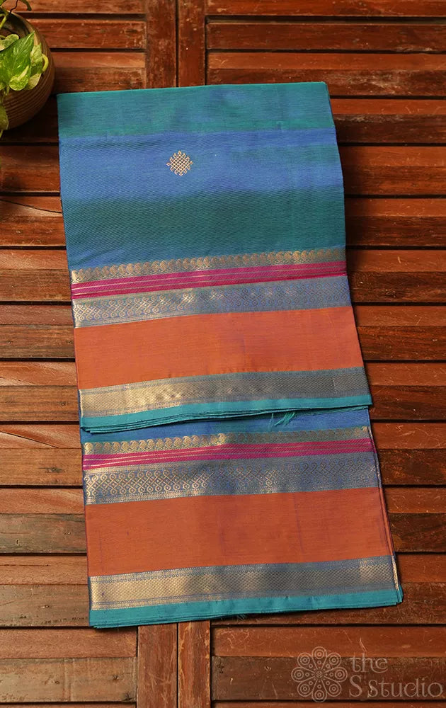Peacock blue silk cotton saree with zari kolam butta