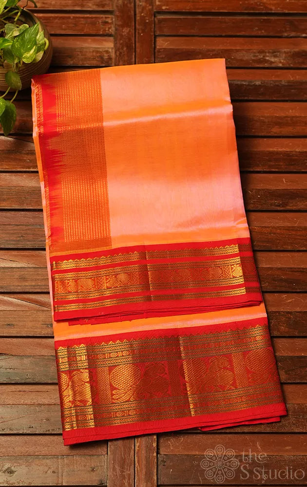 Light peach plain silk cotton saree with Red korvai border