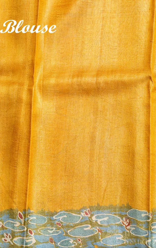 Mustard tussar silk saree with batik prints