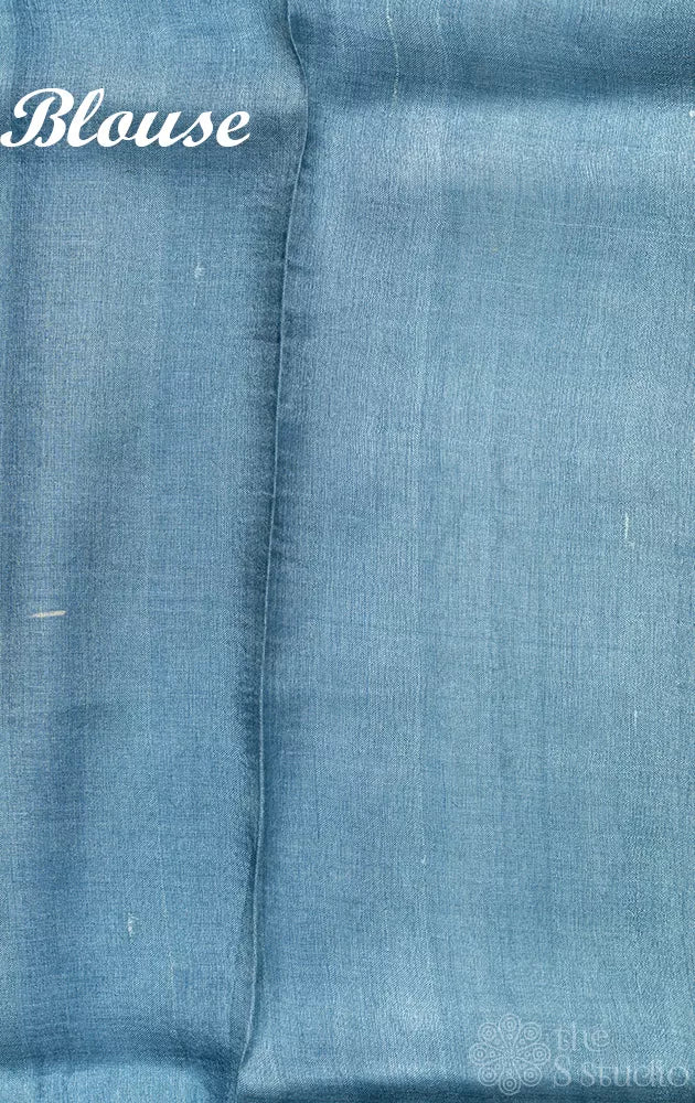 Powder blue tussar silk saree with geometrical batik prints
