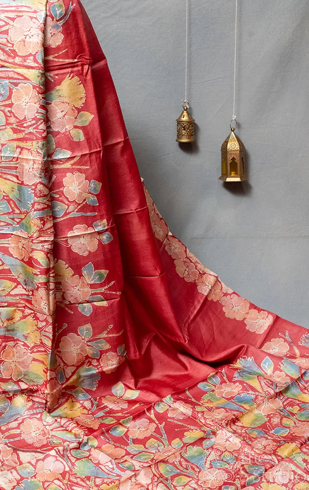 Tomato red tussar silk saree with batik prints