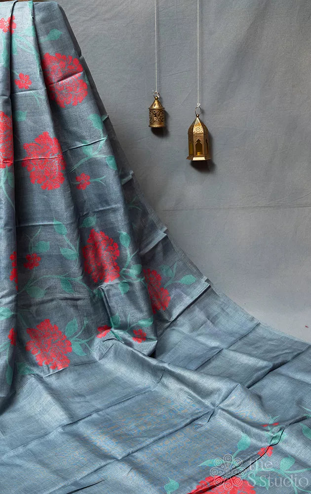 Grey borderless tussar silk saree with floral prints