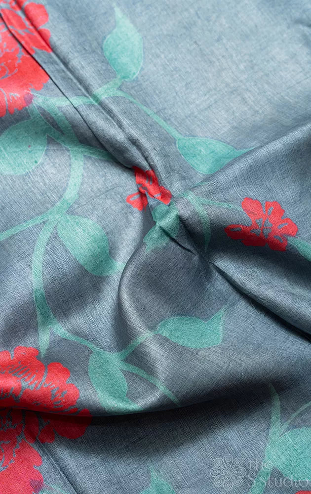 Grey borderless tussar silk saree with floral prints