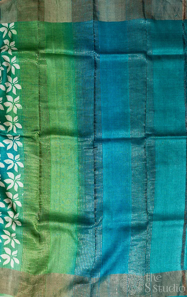 Sea green tussar silk saree with white floral prints