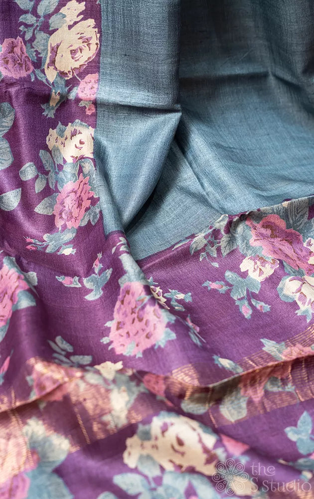 Grey tussar silk saree with purple floral prints on the border