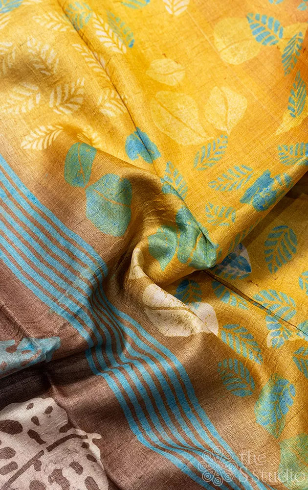 Brown and pink shaded tussar silk saree with leaf prints