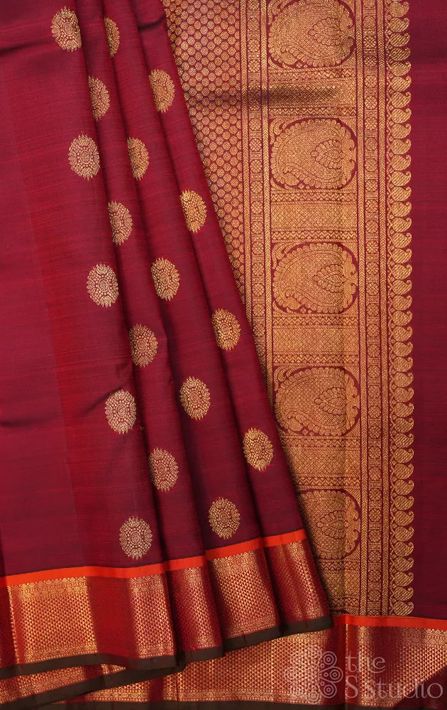 Maroon kanjivaram silk saree with buattas