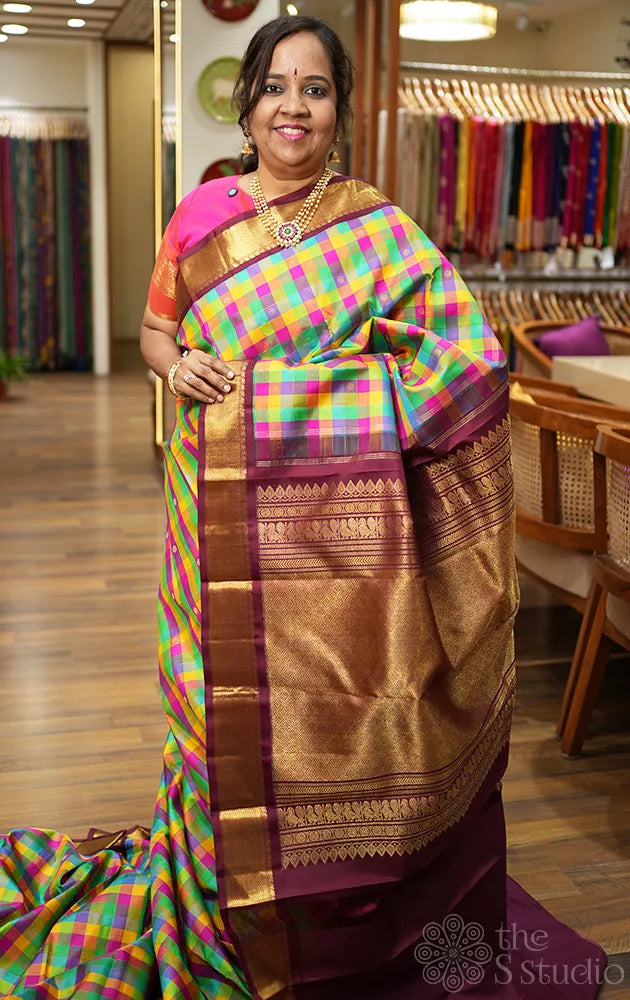 Multicolour checks kanchipuram silk saree with korvai brown border