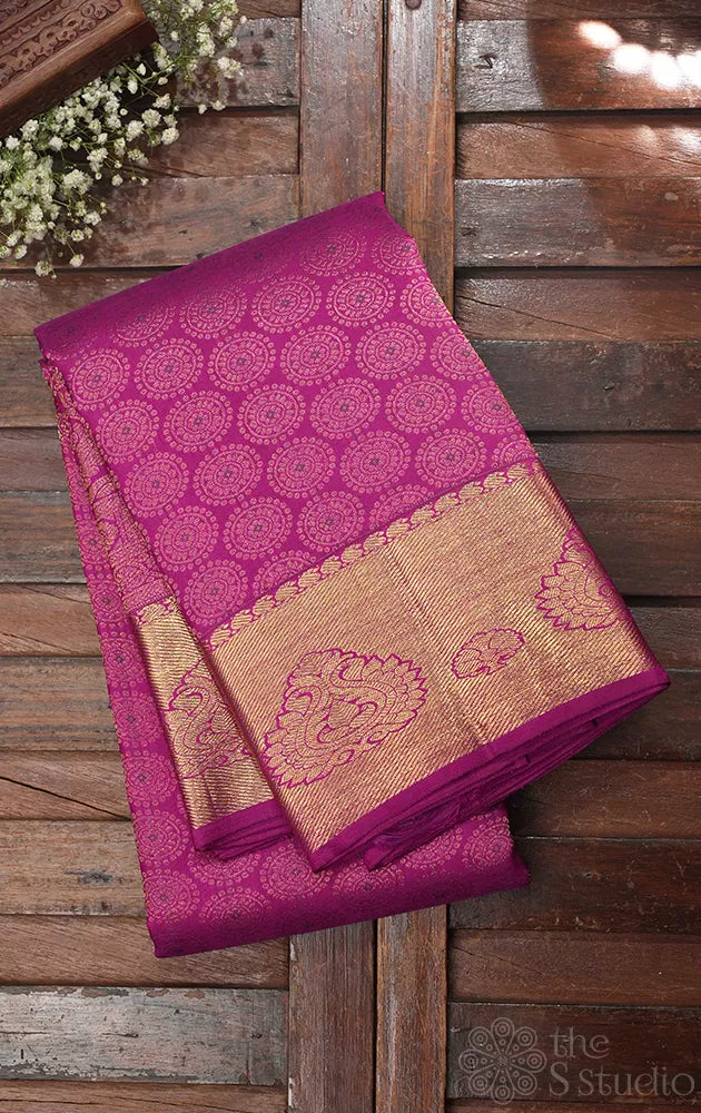 Vadamalli kanchi silk saree with all over designs and zari rich border