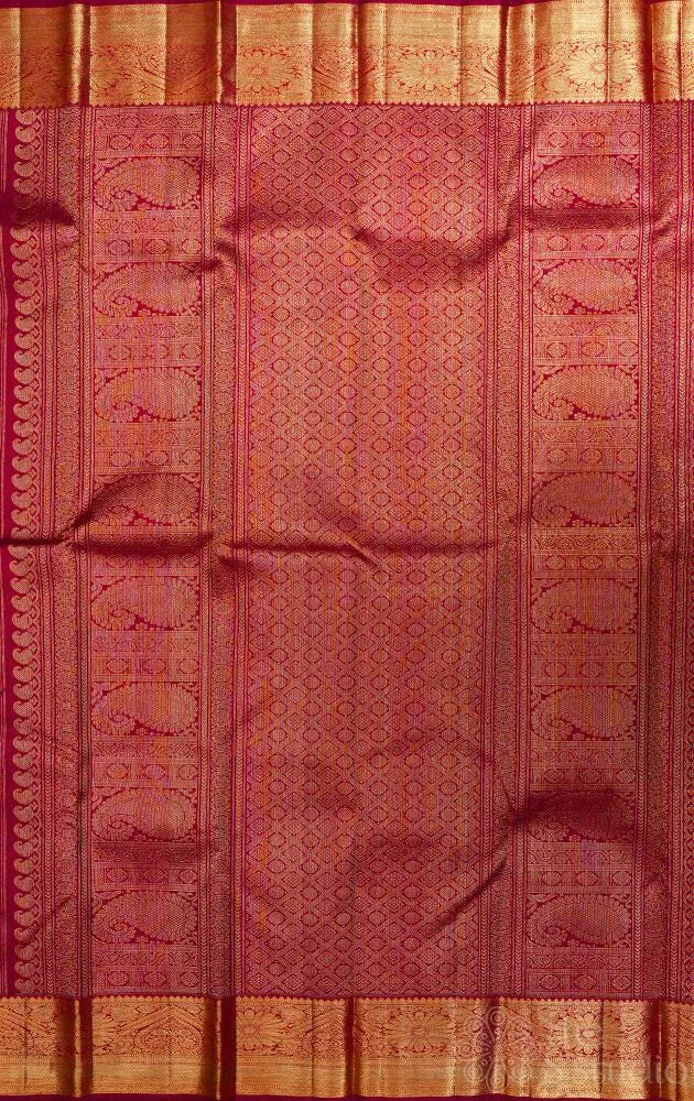 Maroon kanjivaram silk saree with all over floral meenakari motifs and grand border