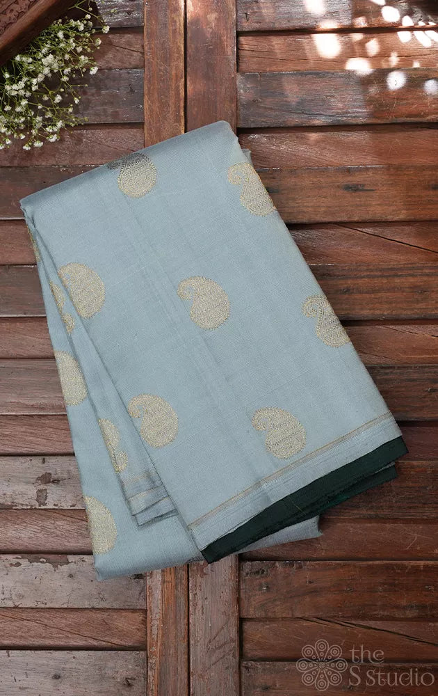 Light Grey borderless kanchipuram silk saree with bottle green pallu