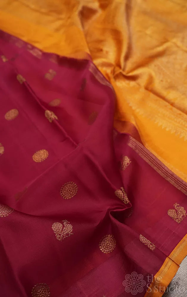 Maroon kora kanchi silk saree with mustard pallu