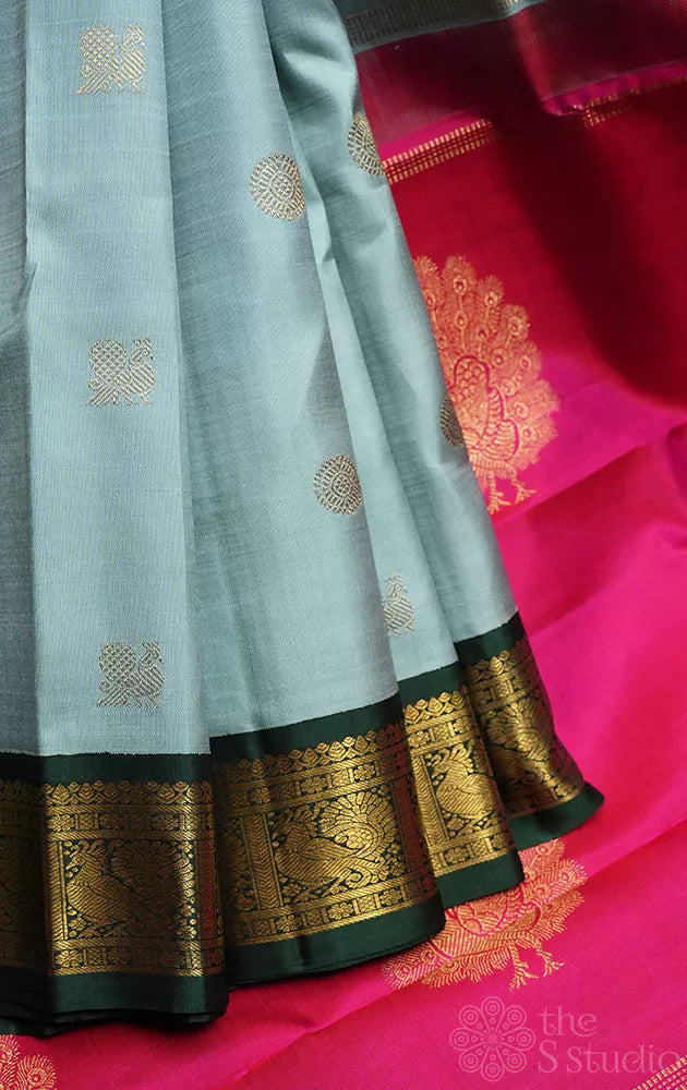 Grey kanjivaram silk saree with ganga jamuna korvai borders