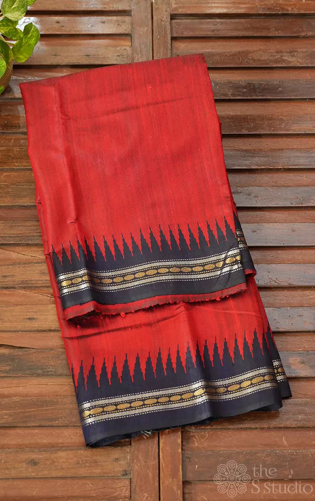 Red raw silk saree with navy blue temple border