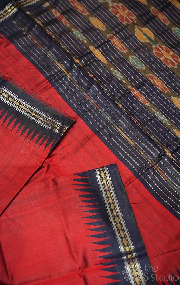 Red raw silk saree with navy blue temple border