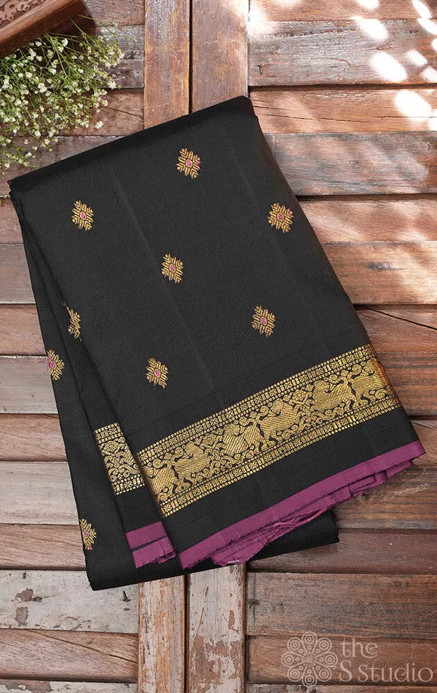 Black kanjivaram silk saree with meenakari butta with dark rani pink selvedge