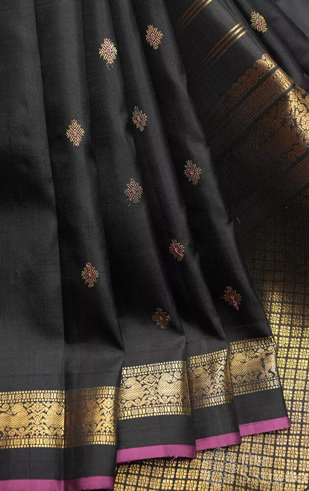 Black kanjivaram silk saree with meenakari butta with dark rani pink selvedge