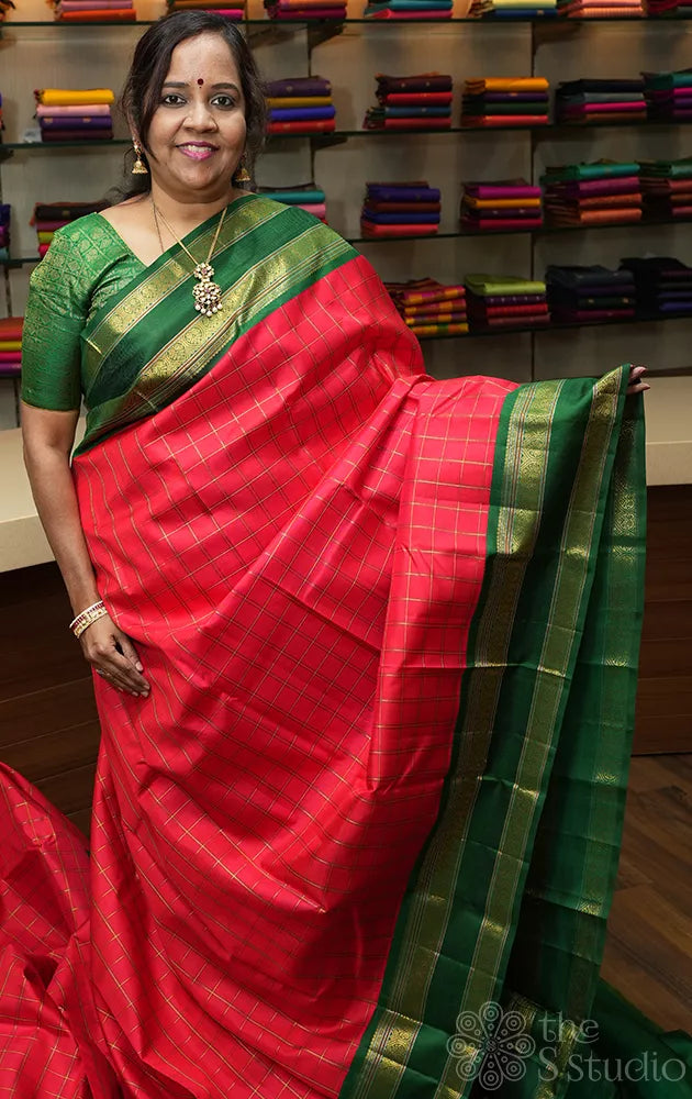Red checked kanchi pattu saree with green rettaipet border
