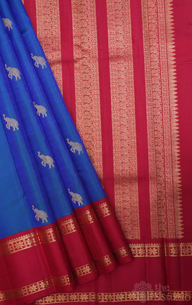 Peacock blue kanchipuram silk saree with korvai rettaipet border