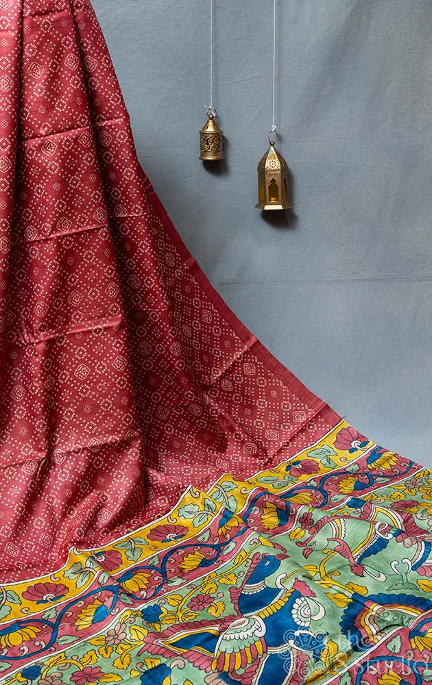 Maroon tussar silk saree with bandhini prints and kalamkari pallu