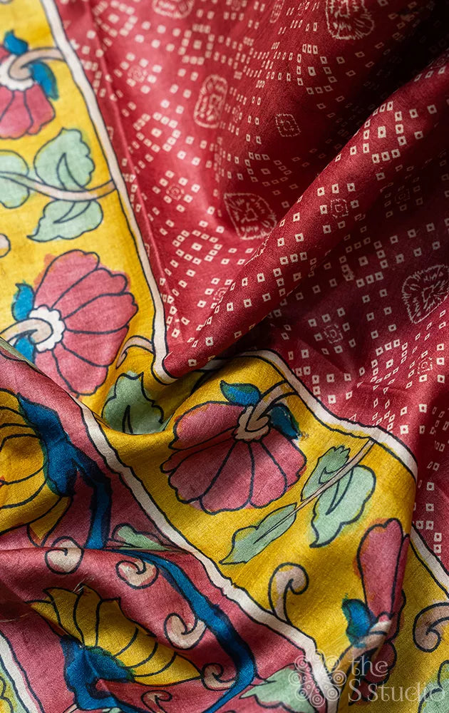 Maroon tussar silk saree with bandhini prints and kalamkari pallu