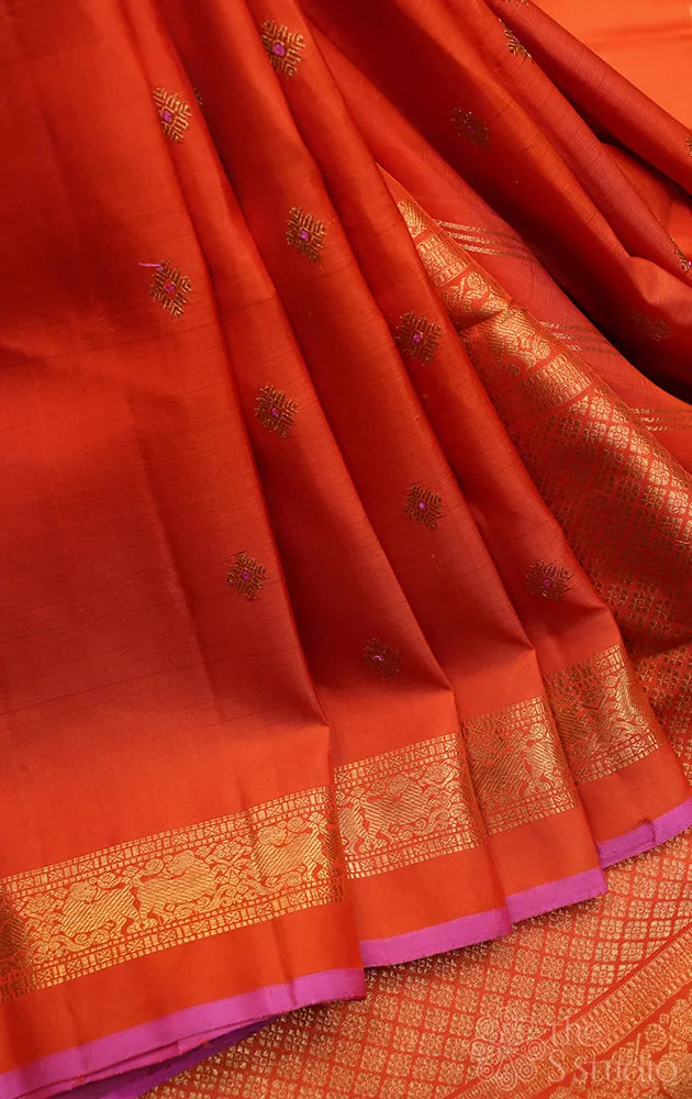 Orange kanchipuram silk saree with meena buttas
