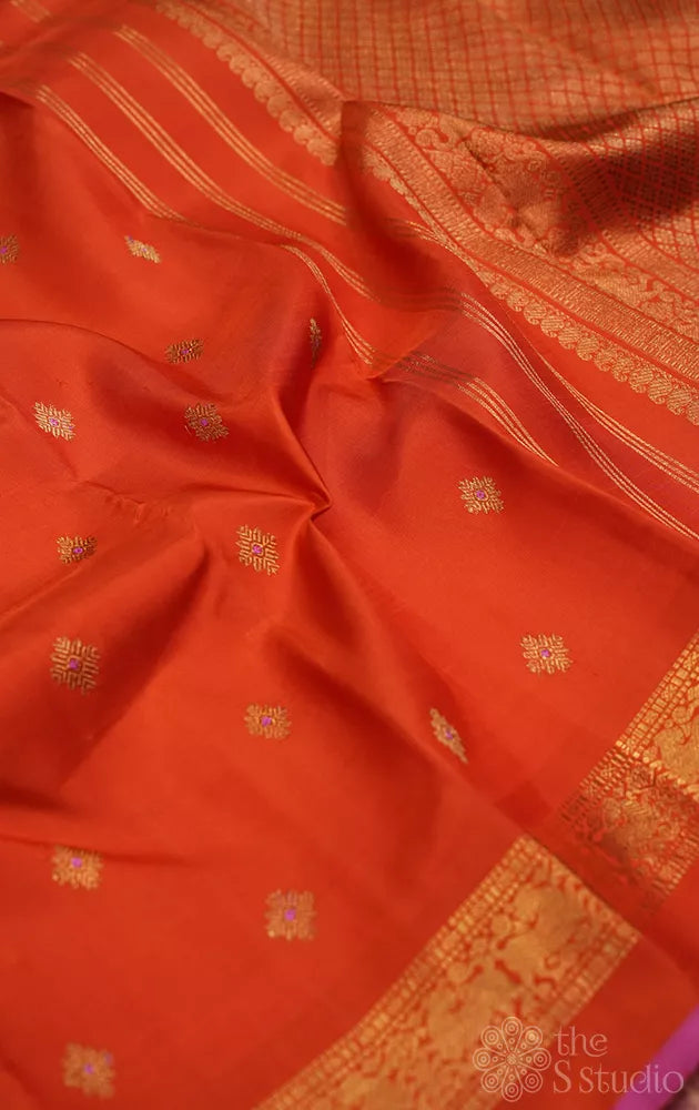 Orange kanchipuram silk saree with meena buttas