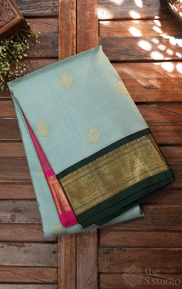 Grey kanjivaram silk saree with ganga jamuna korvai borders