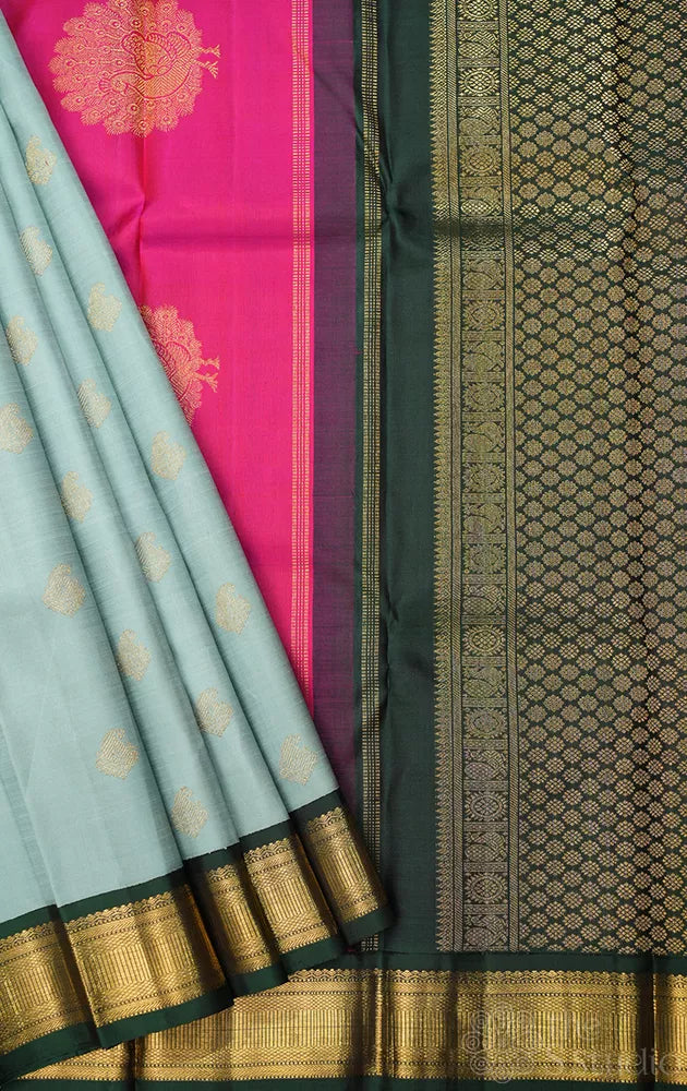Grey kanjivaram silk saree with ganga jamuna korvai borders