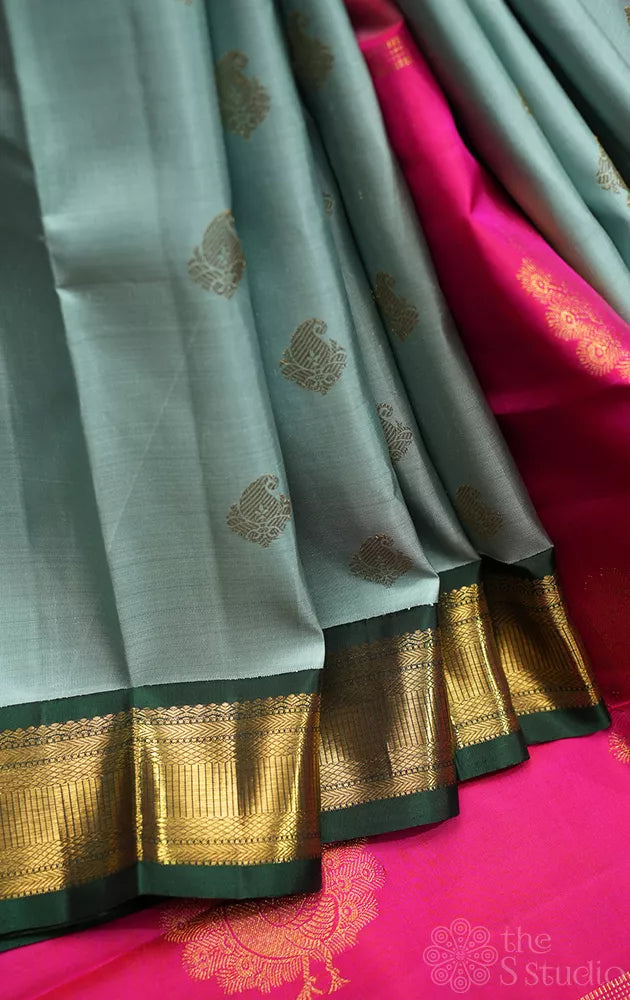 Grey kanjivaram silk saree with ganga jamuna korvai borders