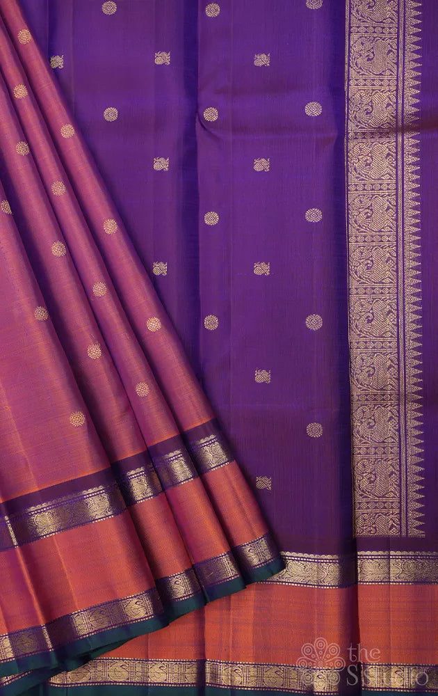 Rust kanchi silk saree with violet pallu
