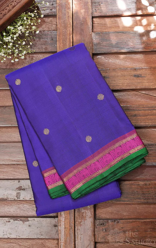 Royal blue kanjivaram silk saree with small magenta border