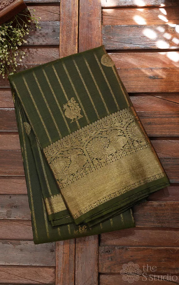 Mehandi green kanchi pattu saree with vertical vangi designs