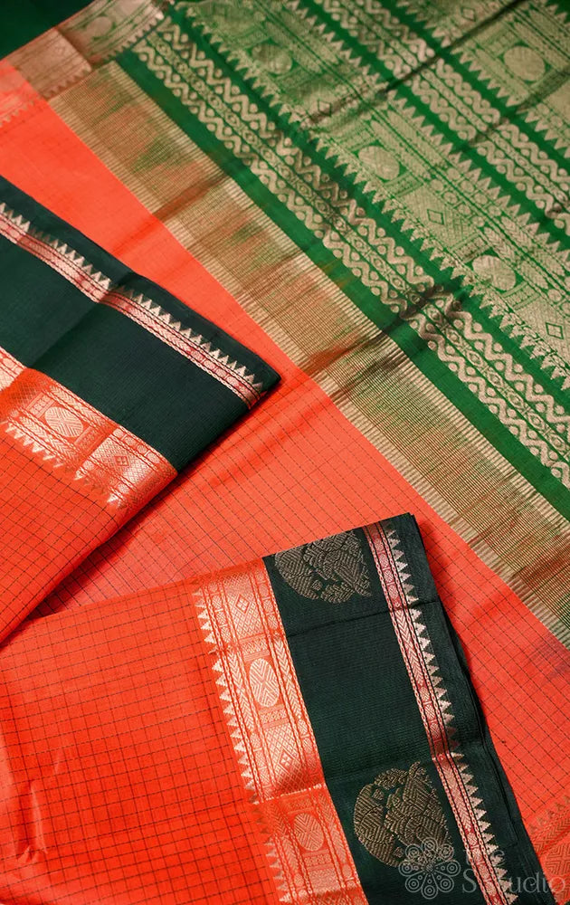 Orange checked handwoven silk cotton saree with korvai border