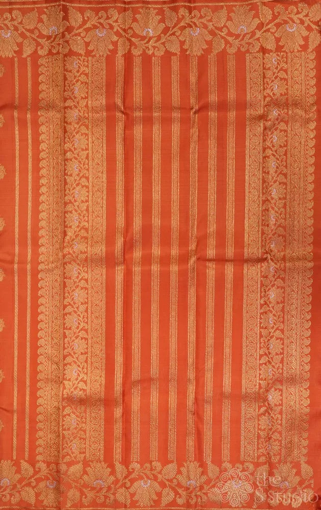 Orange Kanchipuram silk saree with floral weave border