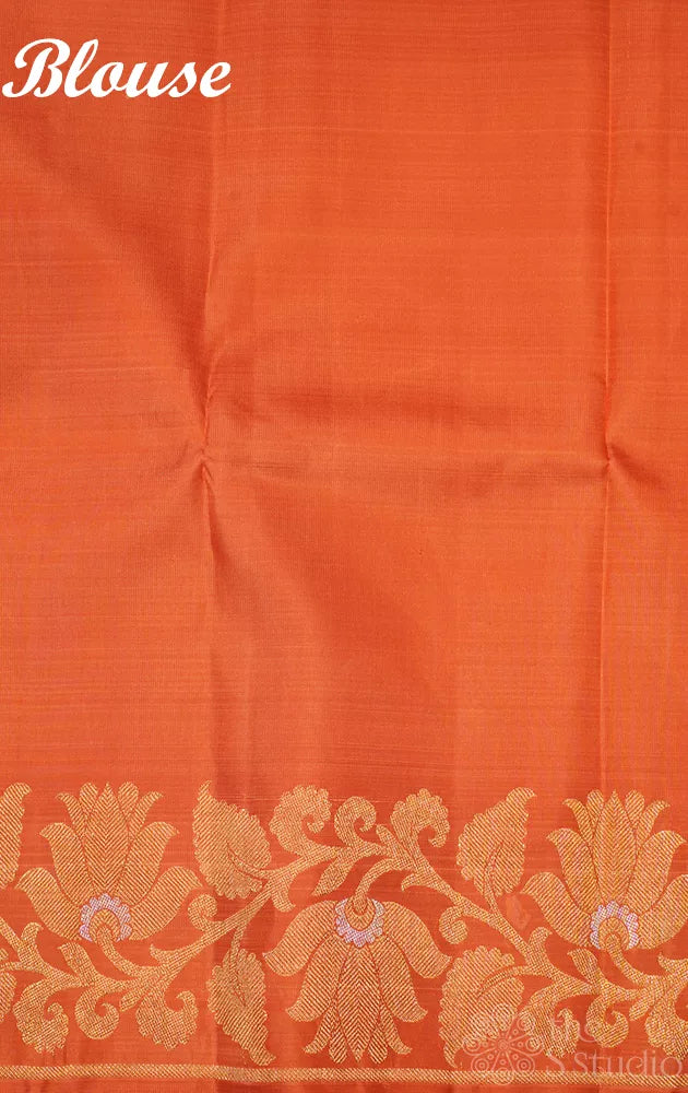 Orange Kanchipuram silk saree with floral weave border
