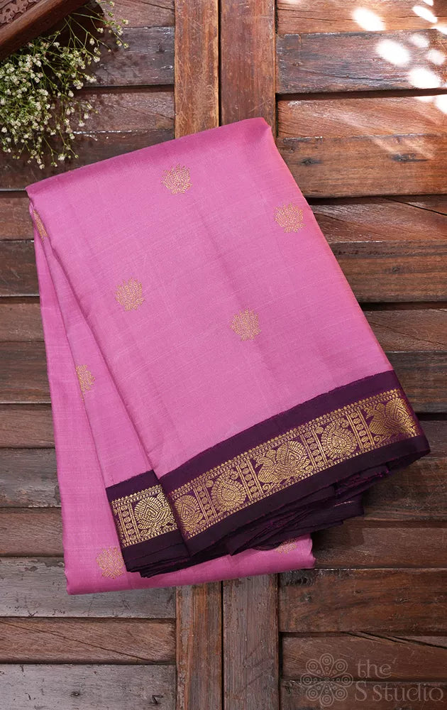 Onion pink kanchi silk saree with small korvai purple border