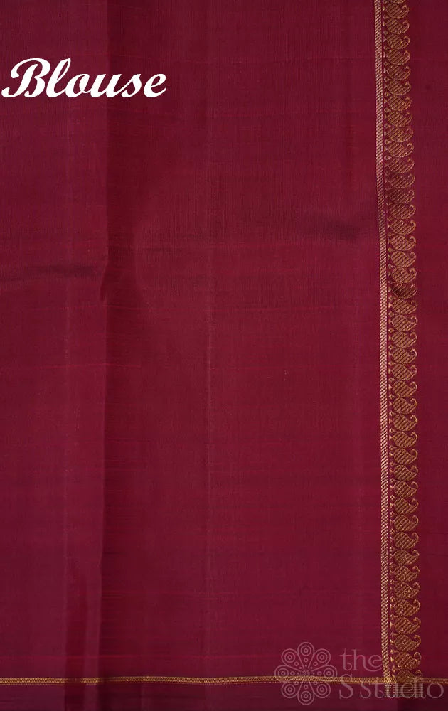 Elaichi green Kanjivaram silk saree with deer zari buttas and contrast pallu