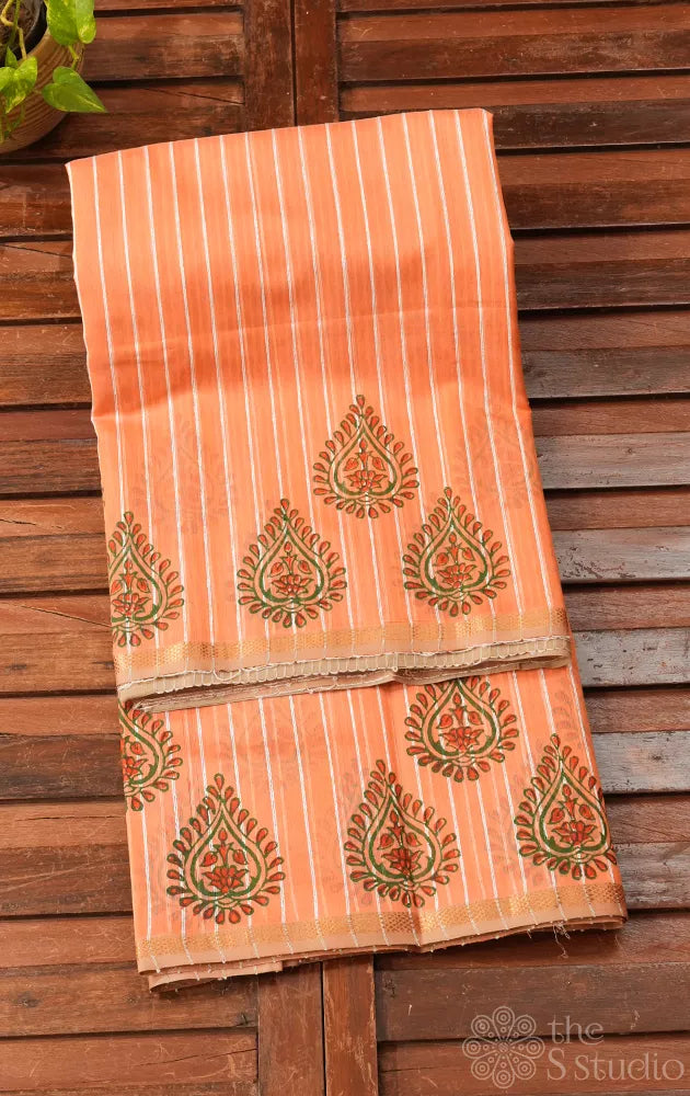 Light orange maheshwari silk cotton saree with block printing on border