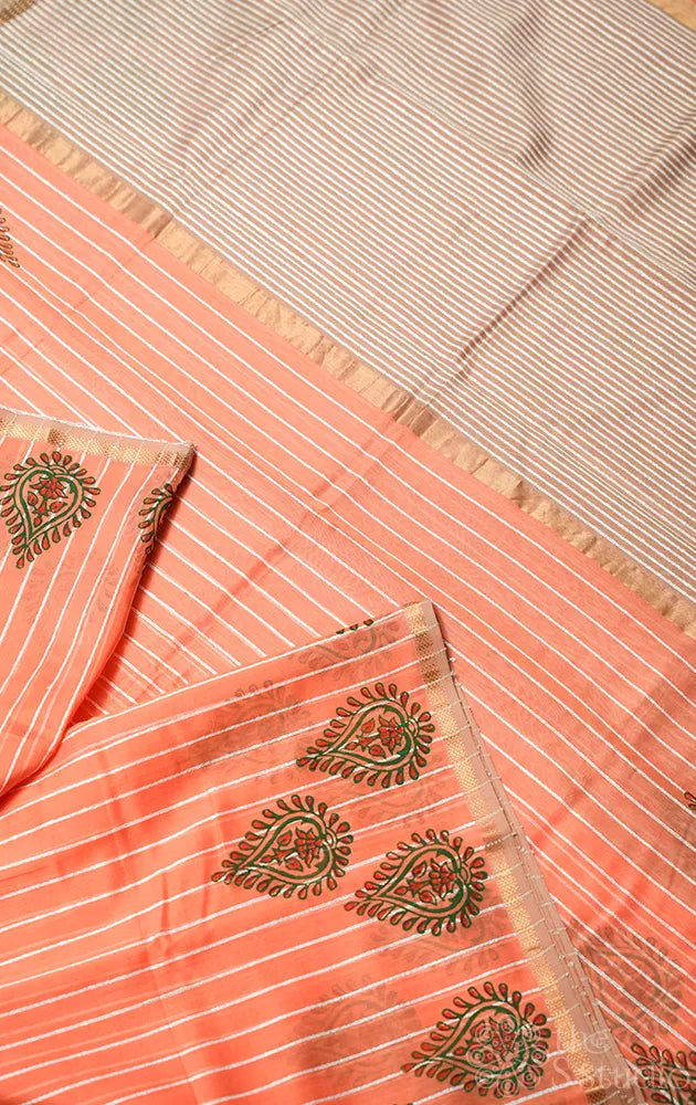 Light orange maheshwari silk cotton saree with block printing on border
