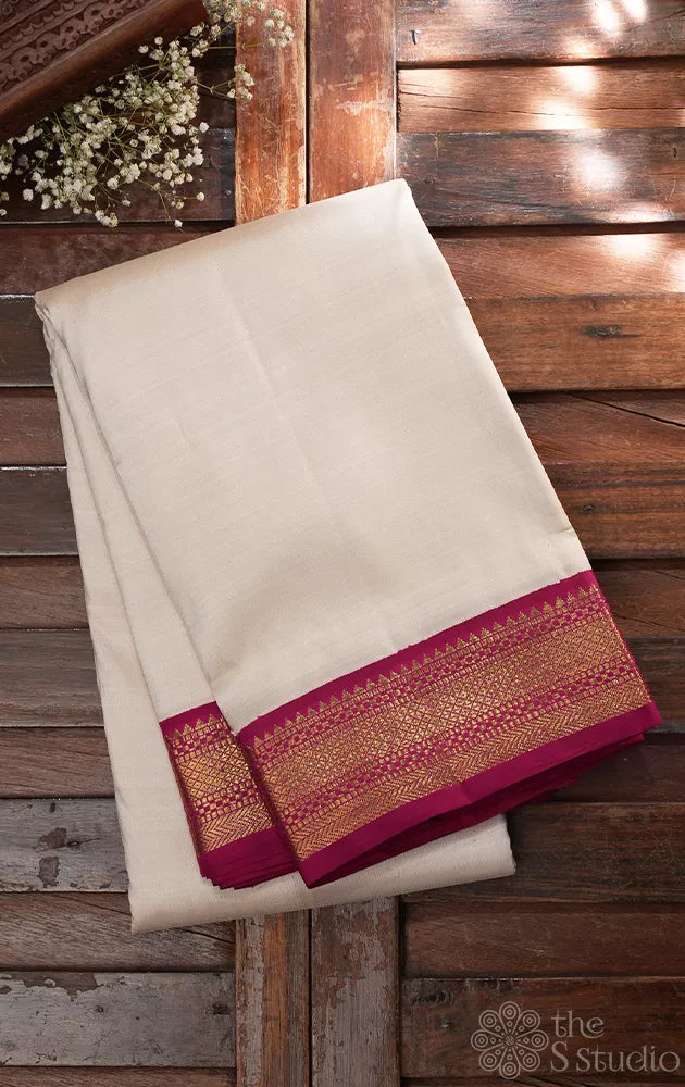 Off white kanchipuram silk saree with korvai maroon border