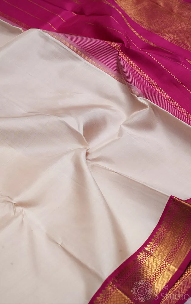 Off white kanchipuram silk saree with korvai maroon border