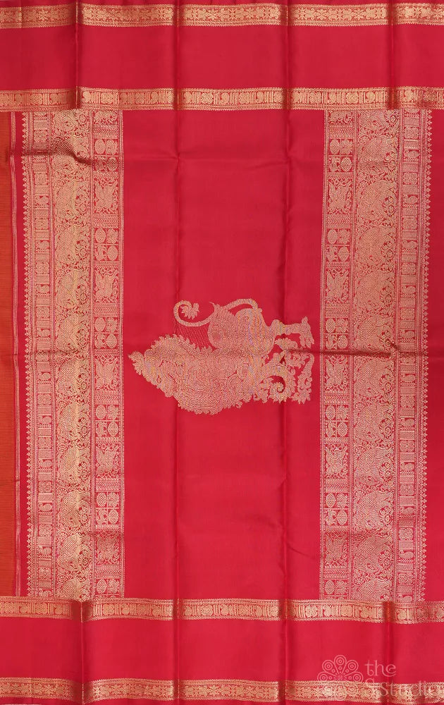 Rust kanchi silk saree with rettaipet red coloured border