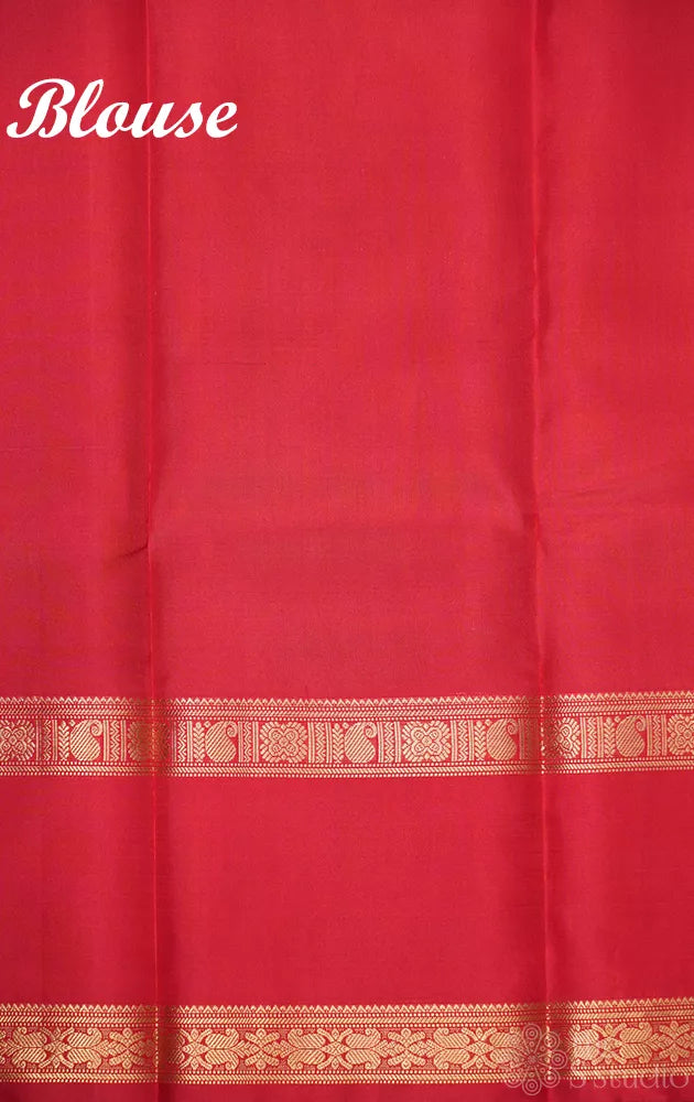 Rust kanchi silk saree with rettaipet red coloured border